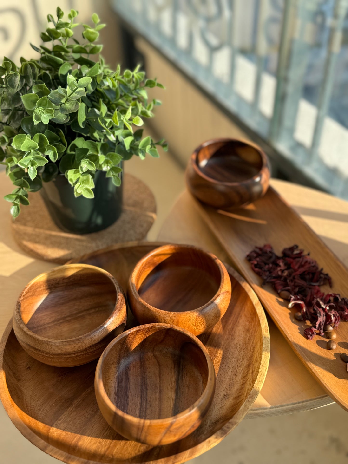 Chic Acacia serveware: matching bowls, plate, and tray.