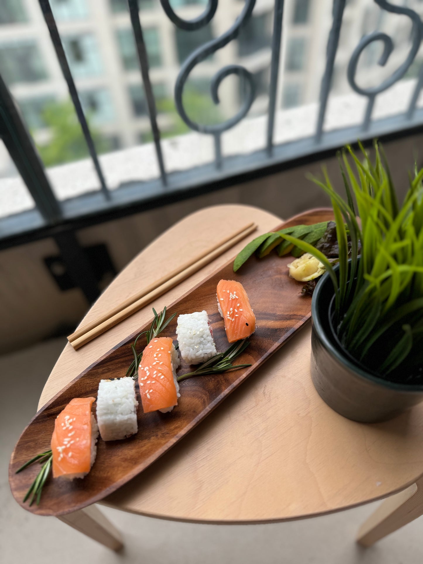 Stylish Acacia wood tray for appetizers or decor.